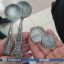 Мошенник из России продал минчанину 10 фальшивых монет под видом клада 0