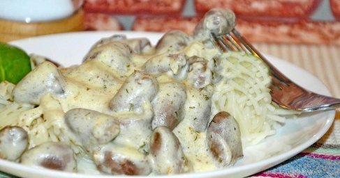 Куриные сердечки в соусе